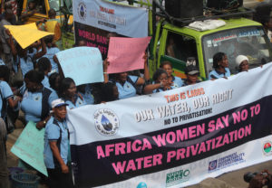 Women in Lagos demand a strong, public water system.
