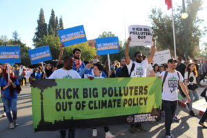 Our team— pictured here at the 2016 U.N. climate talks in Marrakech, Morocco— dares to demand just climate policy free of Big Polluters' influence.