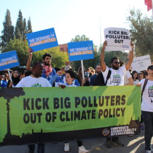 Our team— pictured here at the 2016 U.N. climate talks in Marrakech, Morocco— dares to demand just climate policy free of Big Polluters' influence.
