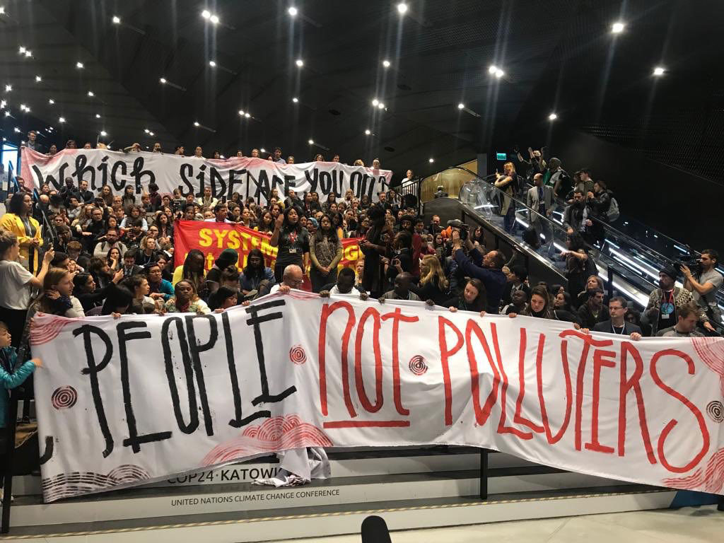 Hundreds of activists challenge governments to put people over polluters’ profits on the last day of the COP24 climate treaty negotiations in Poland in December 2018. The movement to kick Big Polluters out has grown mightier than ever.